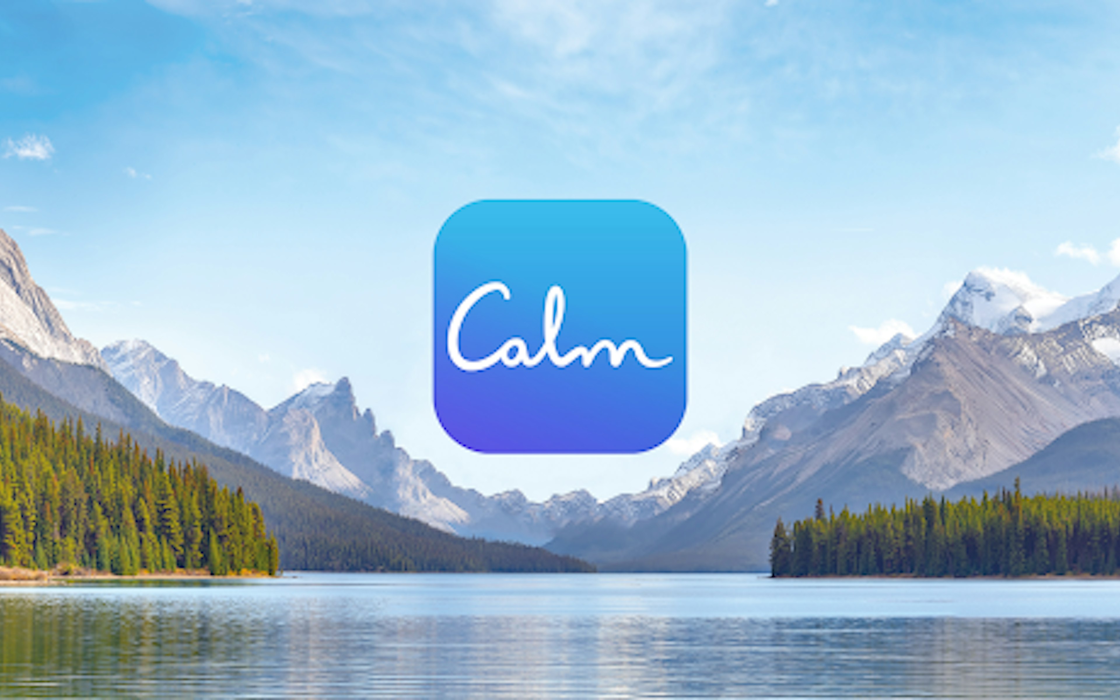 Image of a lake with trees and mountains in the background. The calm logo is in the middle of the image.