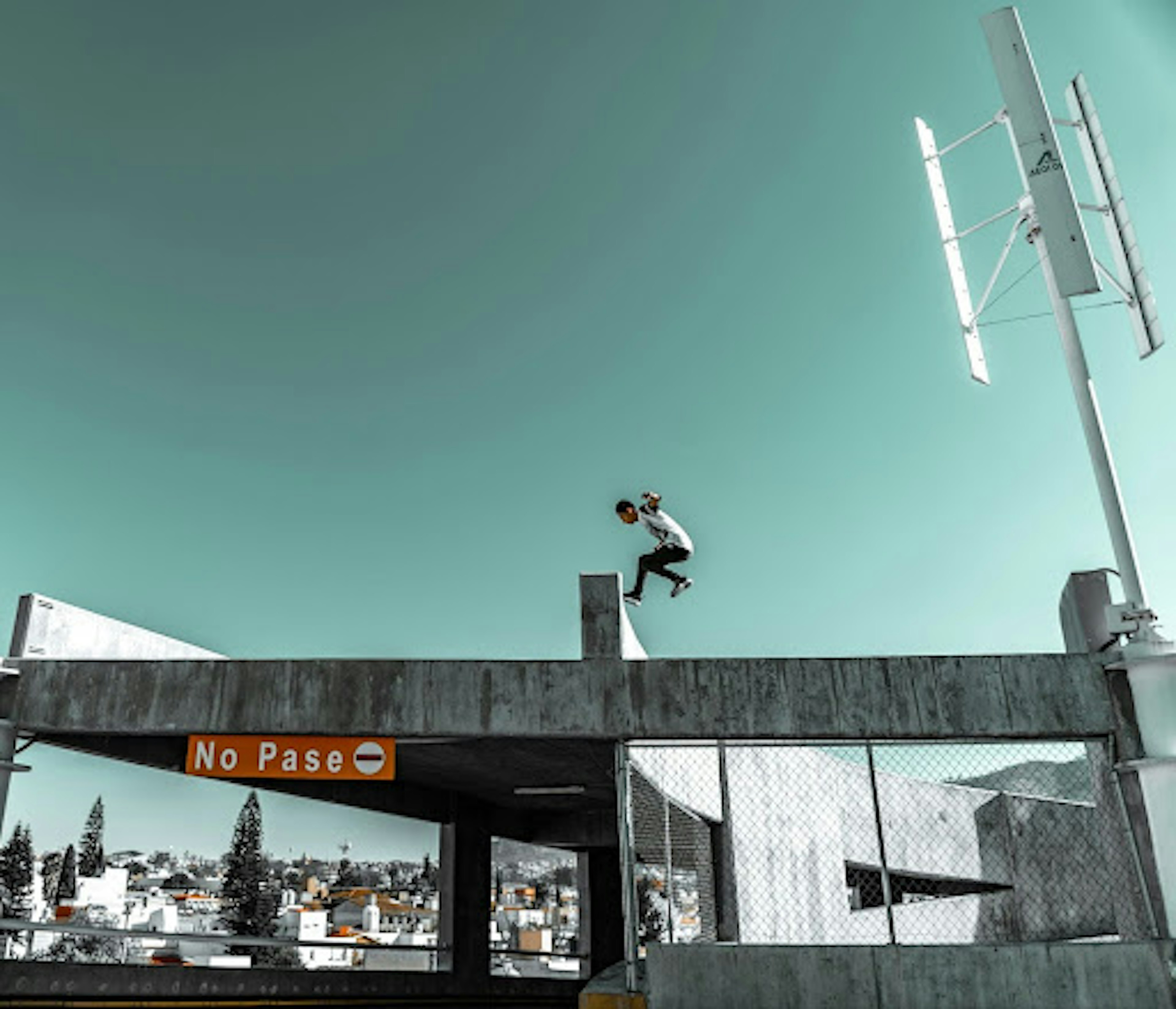https://unsplash.com/photos/man-jumping-on-gray-concrete-buildingg-slztS-YNSXg